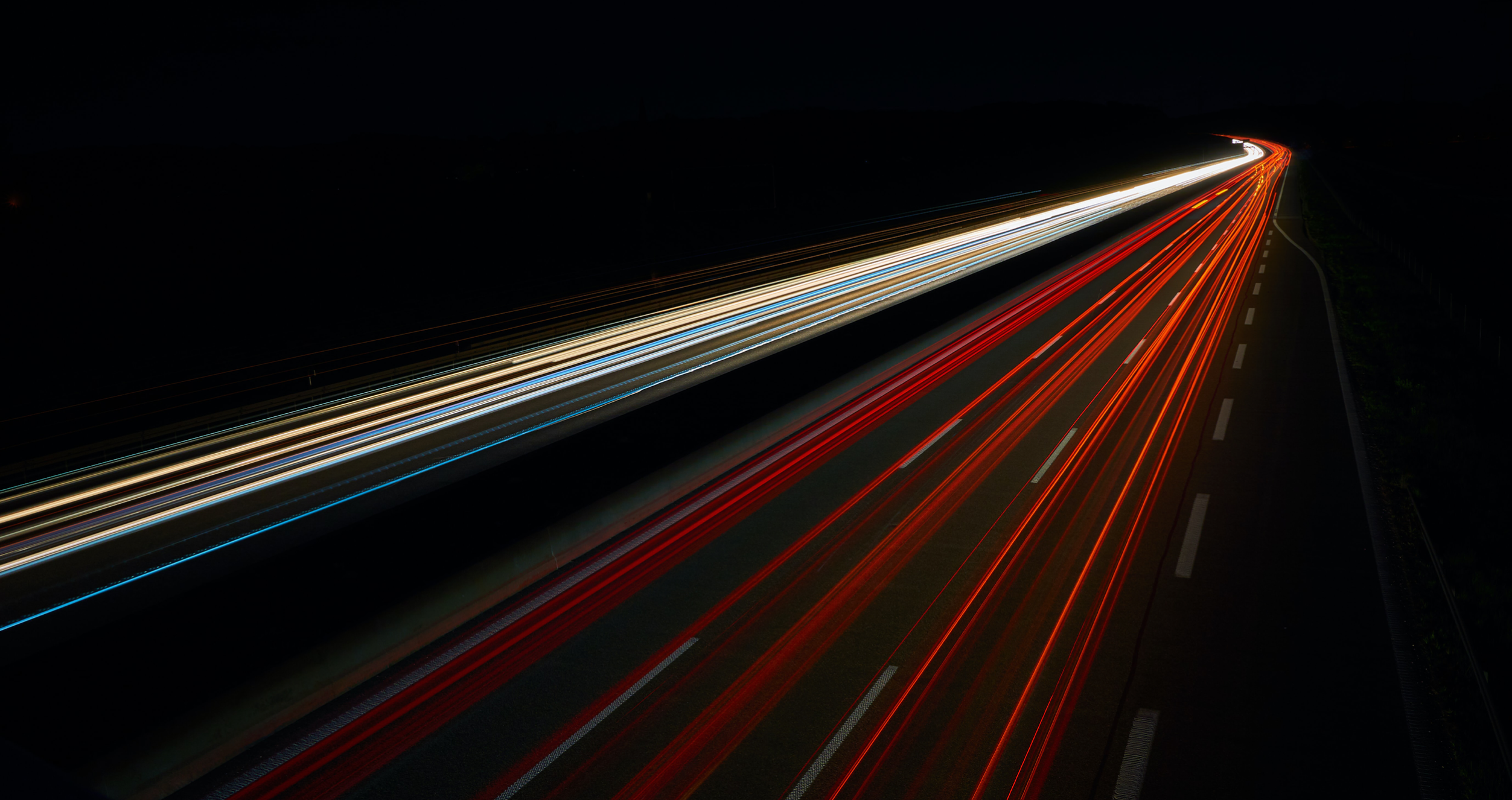 abstract red and white light trails