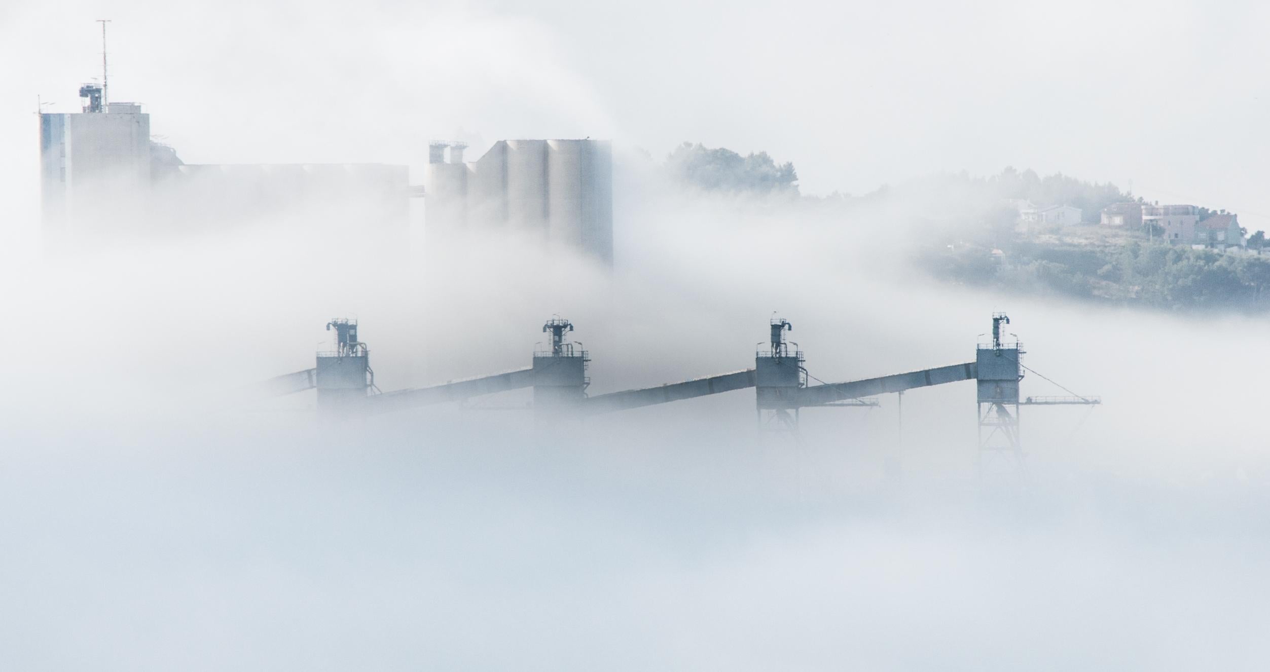 Factories obscured by smoke