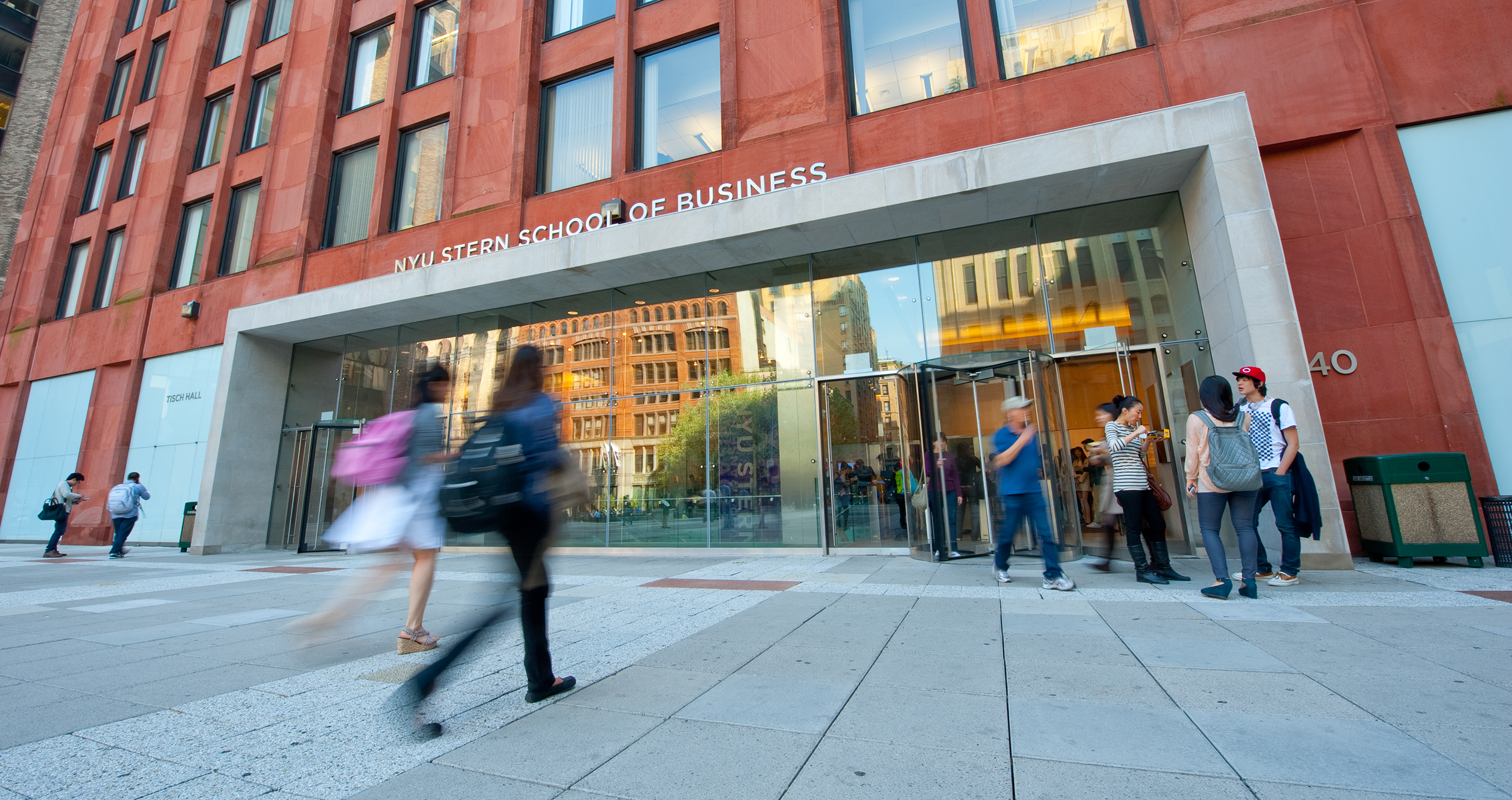 NYU Stern students outside in Gould Plaza