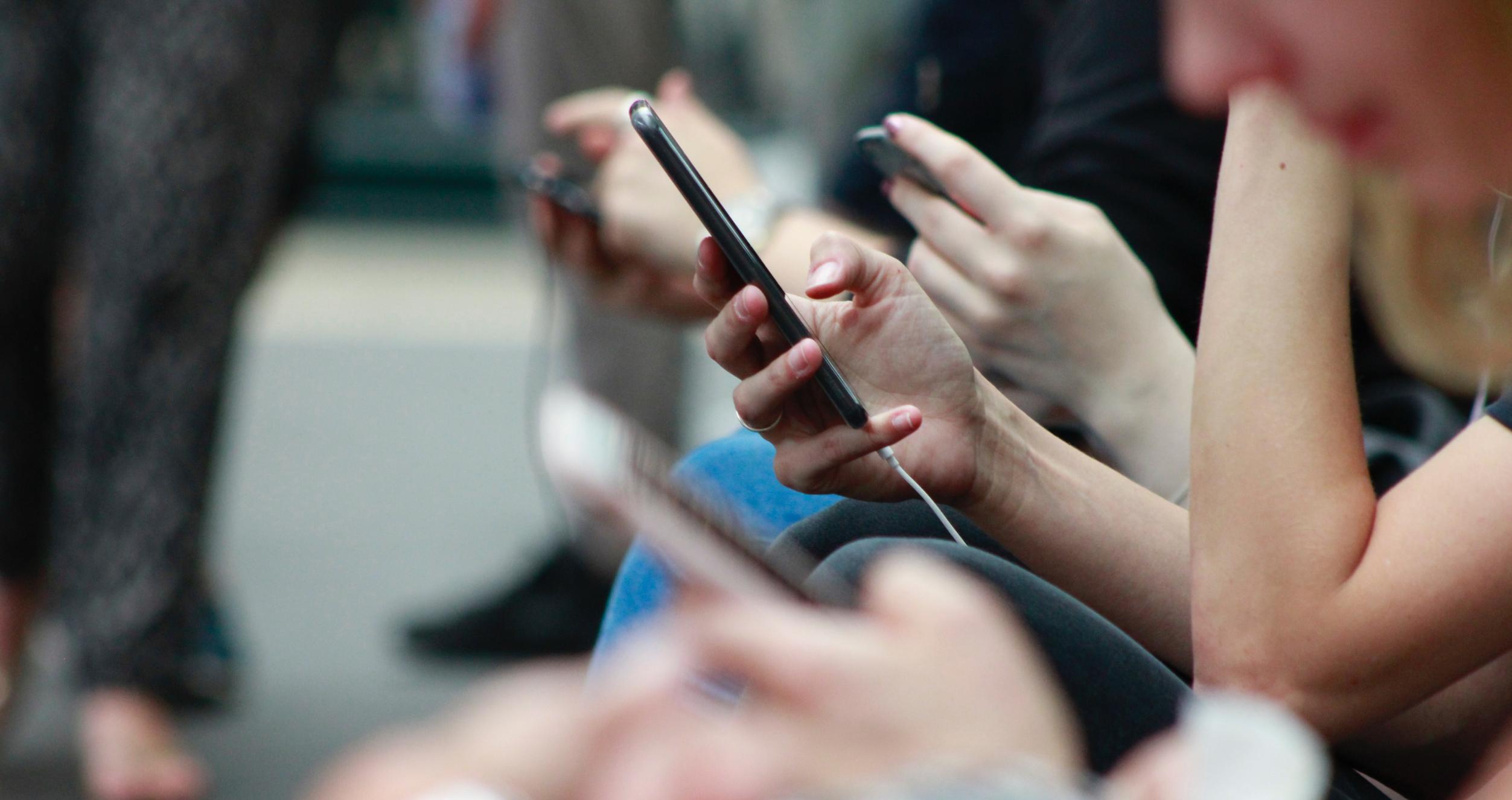 Closeup of person holding smartphone