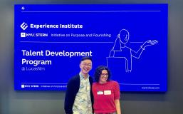 Two people in front of a powerpoint about LucasFilm