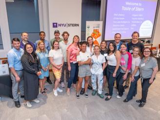 A group photo of alumni that showcased their businesses and products at Taste of Stern 2023.