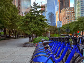 City sidewalk with bikeshare.