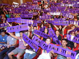 Students holding up " I am Stern" banners