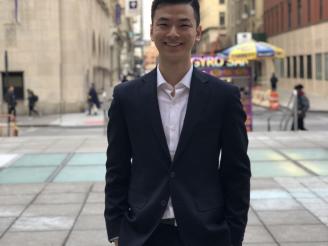 Daniel Fang in front of Tisch Hall