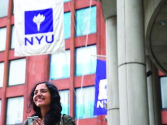 Young woman smiling in front of KMC