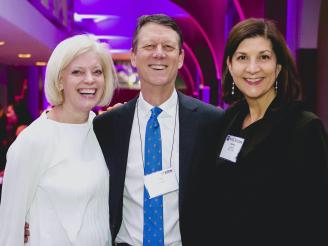 From right to left: Christine Schneider (MBA ’94), Todd Spillane, and Susan Jurevics (MBA ’96) at a Stern Holiday Celebration.