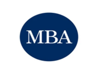 white-colored word "MBA" on a dark blue circle