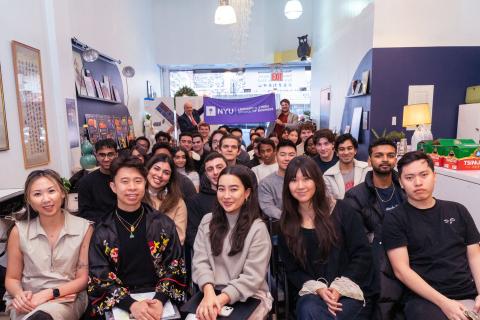 Students in Professor Bruce Buchanan’s section of the “NYC Consulting Capstone” deliver their final presentations to clients from Welcome to Chinatown
