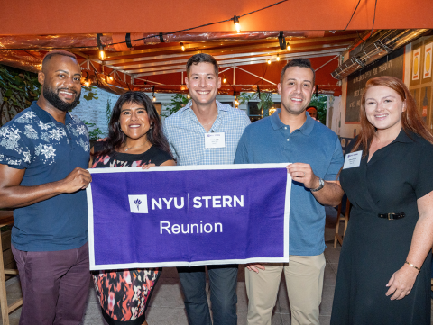 Members of the NYU Stern Alumni Council pose to promote Reunion