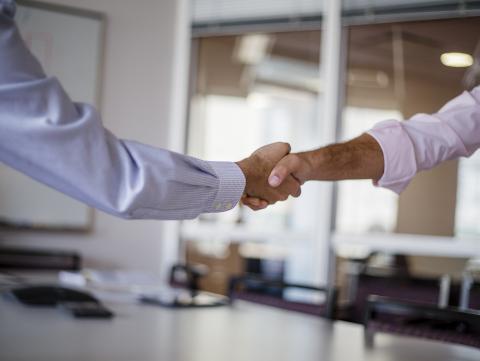 image of two hands shaking