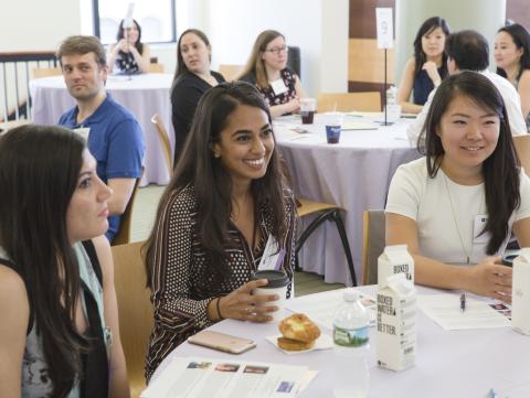 Alumni gather at a women's panel during Stern Reunion