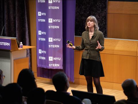 Tensie Whelan speaking on stage at Stern
