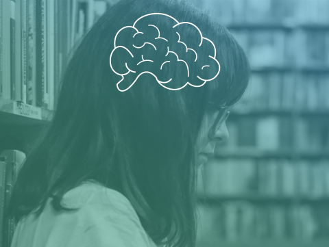 Student reads in library, a brain is illustrated over her head