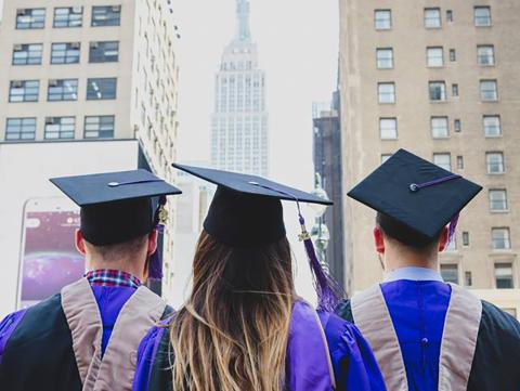 Graduates in front of the Empire State Building