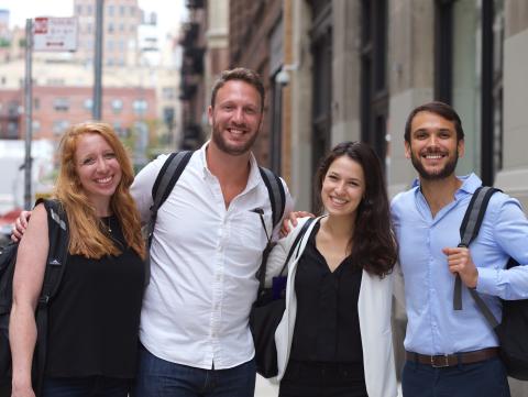 NYU Discounts Four students posing outside