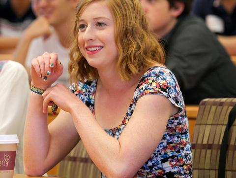 A student listens in a classroom in NYU Stern