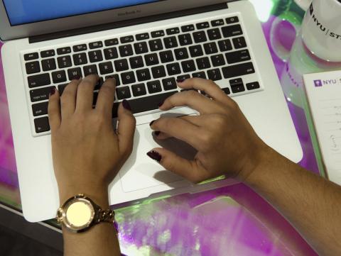 laptop with hands