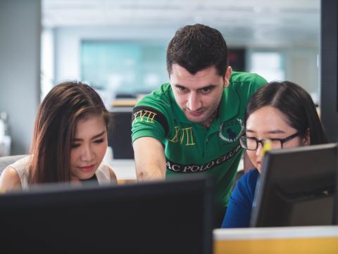 Students around a computer