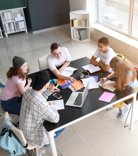 A student team collaborates on a group project