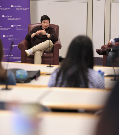 Jen Wong and Arun Sundararajan sitting and talking