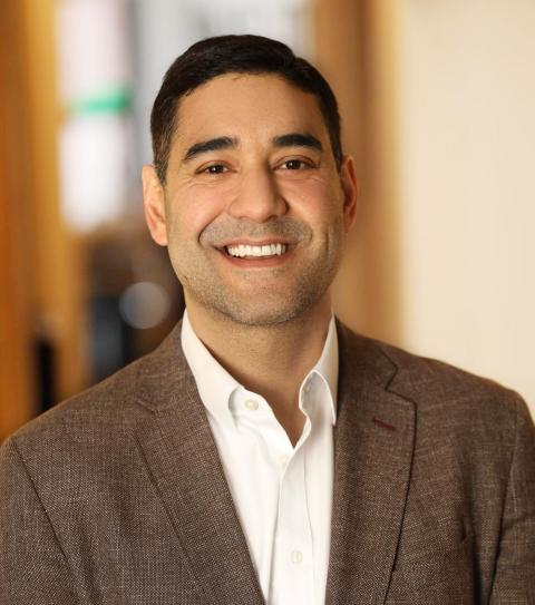 Clinical Associate Professor Ashish Bhatia Smiling