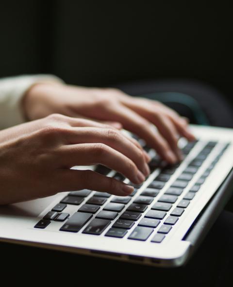 typing on a computer typing on a computer