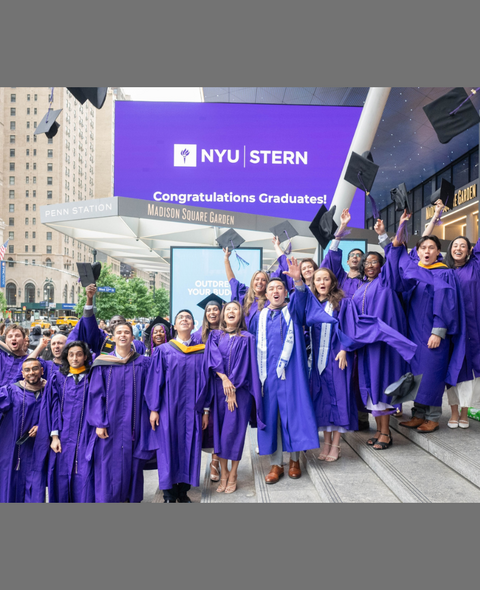 Stern students in front of MSG celebrating graduation