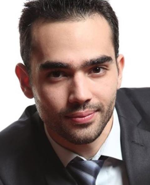 Headshot of Carlos Fernandez