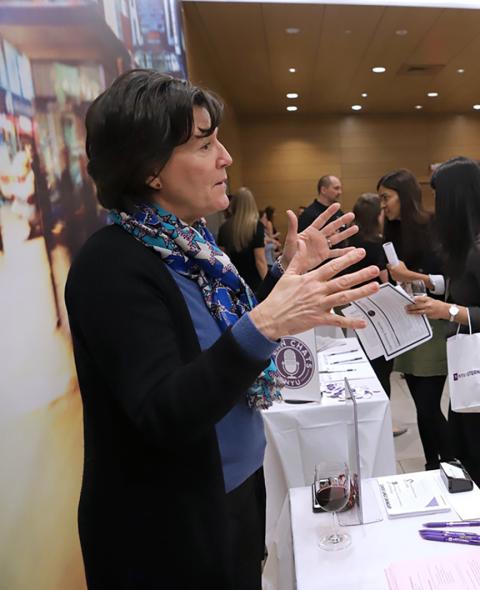 Eliza Shanley speaks with a Langone student at Langone LAB