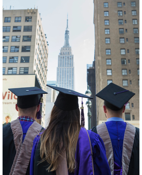 Graduates looking up