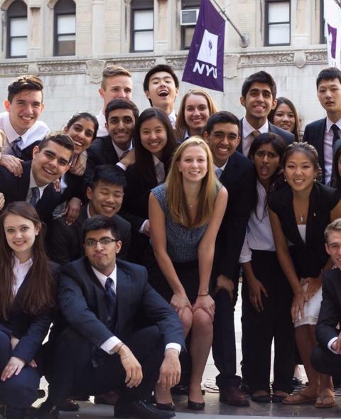 students in a student club pose together