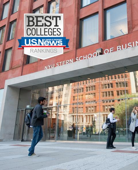 Students walk in front of Tisch Hall