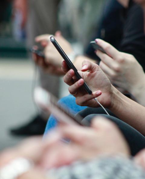 person holding black phone