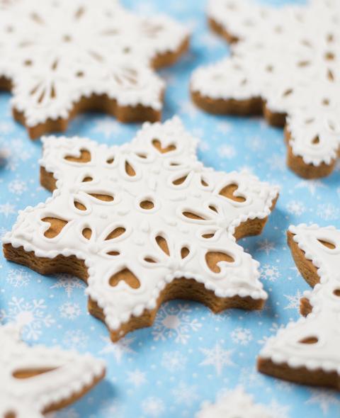Cookies shaped like snowflakes Cookies shaped like snowflakes