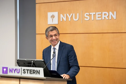 NYU Stern welcomed Dean Designate Bharat Anand at an event with faculty and staff in April 2025