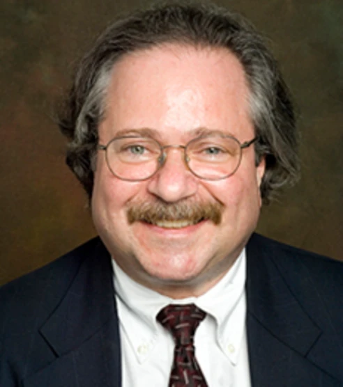 headshot of irv schenkler