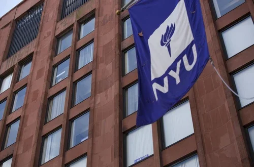 NYU flag in front of Tisch