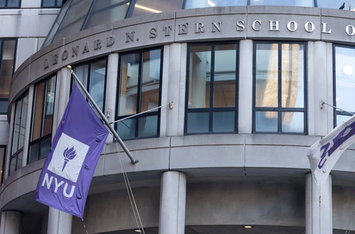 NYU flags flying in front of KMC