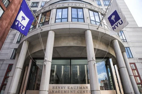 Front of KMC with NYU Flags