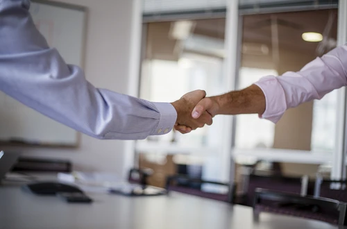 image of two hands shaking