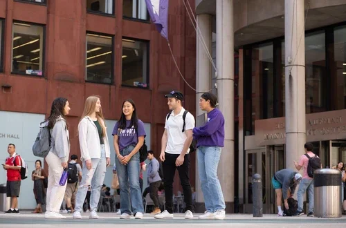 Stern students interact on Gould Plaza