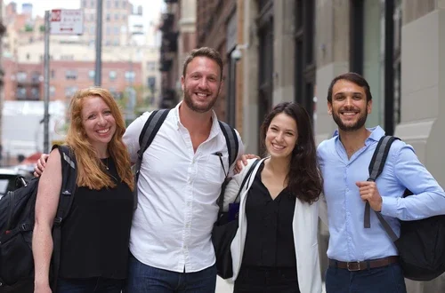 Four students posing outside