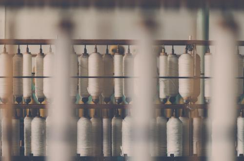 Spools of cotton reels in a manufacturing plant