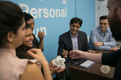 Students and professor in 3D printing lab