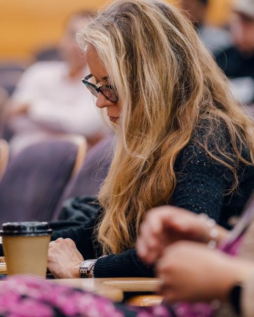 Alumni engage with a lecture at NYU Stern