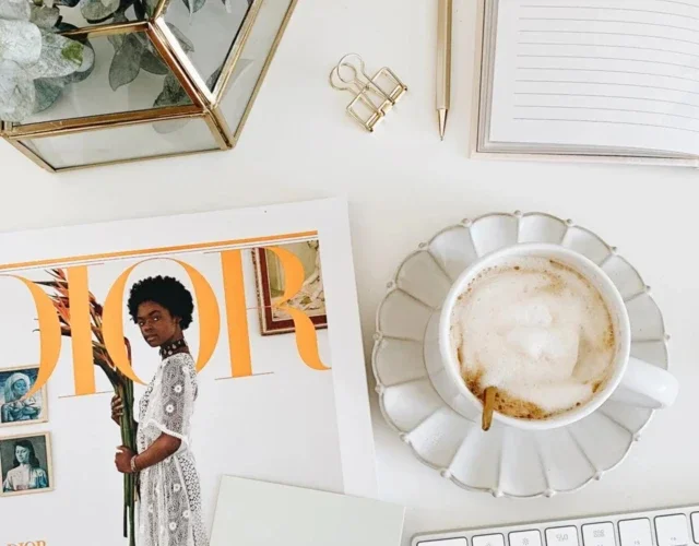 Dior magazine cover on coffee table