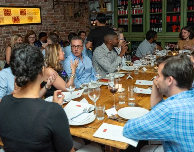Members of the NYU Stern Alumni Council gather for dinner