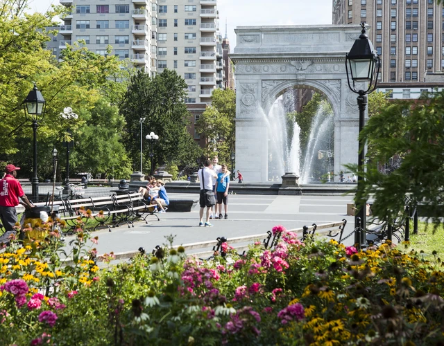 People in Washington Square Park in the Spring in front of the Arch