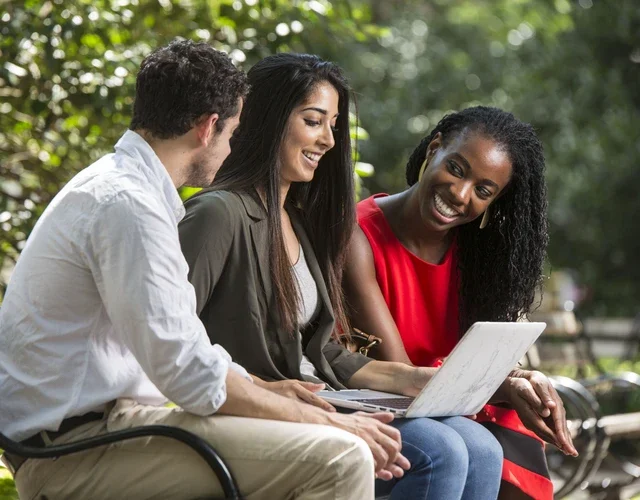 students work together in Washington Square Park